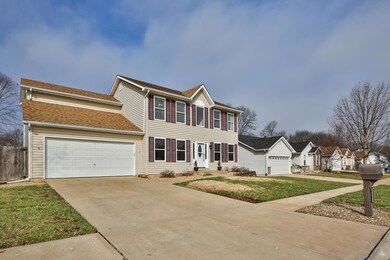 Concrete driveway leads to the 24x20 over sized tw