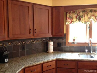 Kitchen. Beautiful Cherry Cabinets in this bright 