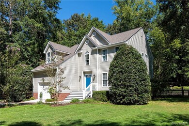 View of front of property with a front lawn