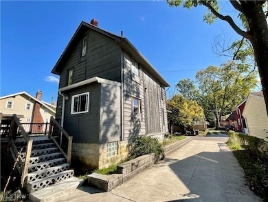 View of side of home with a chimney