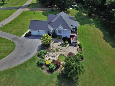 Spacious Paved Driveway 2-car Garage