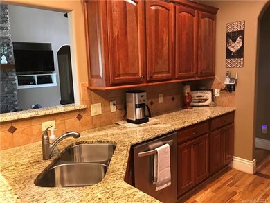 PLENTY OF COUNTERTOP SPACE AND CABINETS