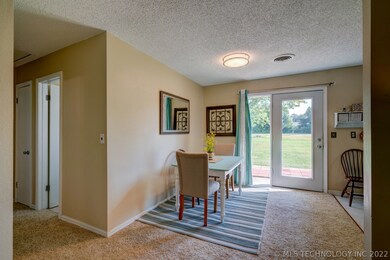 DINING ROOM, NEWER WIDER EXIT DOOR INSTALLED AND A