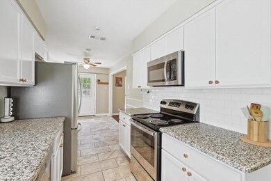 Kitchen featuring appliances with stainless steel 