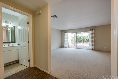 Guest bath on left, Living Room on right.