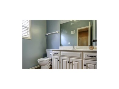 Main level half bath off kitchen