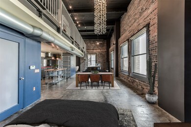 Open 2nd bedroom is located on main level with bat