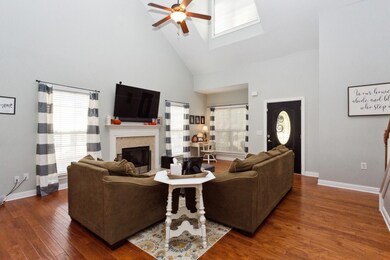 The tall ceilings with inpouring natural light make the room feel spacious and grand.