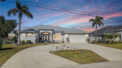 View of front of house featuring a garage and a la