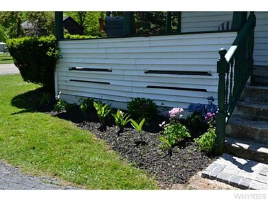 Exterior Front New landscaping along the driveway/