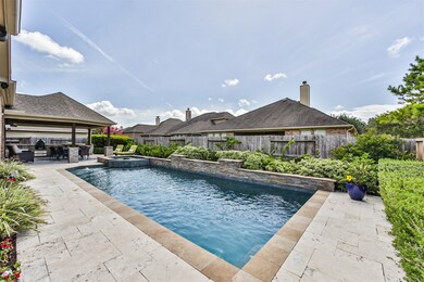 The pool is heated and salt water and features a f