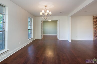 The dining room is open to the living room and cou