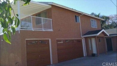3-Car Garage with a big balcony above (View from b