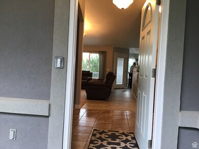 Hall with tile patterned floors