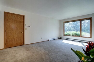Large Windows Flood the Room With Light