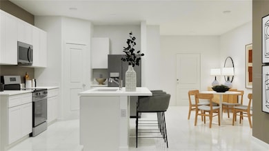 Virtually staged. Kitchen