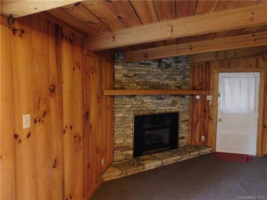 Fire place, outdoor exit to car port.