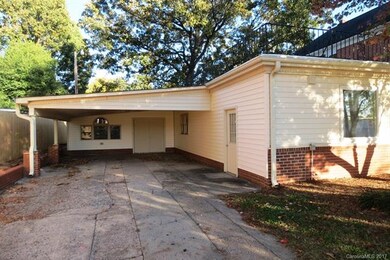 THIS IS THE BACK ENTRANCE TO THE HOME AND ATTACHED