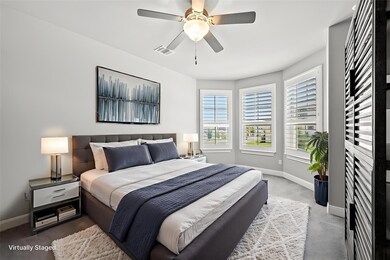 Bedroom featuring carpet floors and ceiling fan