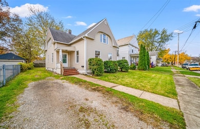View of front of property featuring a chimney