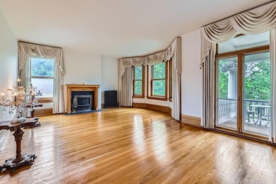 Living room with double doors to the fabulous veranda