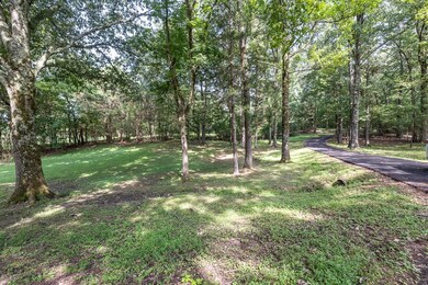 Part of the wooded grounds.