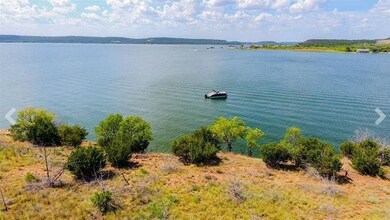 Drone view of lot and central water view.