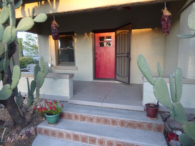 New concrete steps in front.