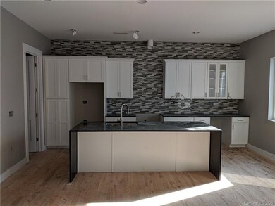 Glass tile backsplash, Black pearl granite with wa