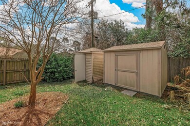 View of shed with fence
