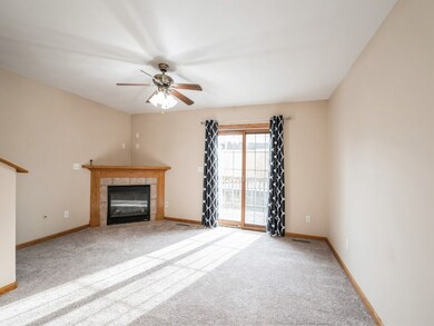 Corner fireplace by slider to private deck