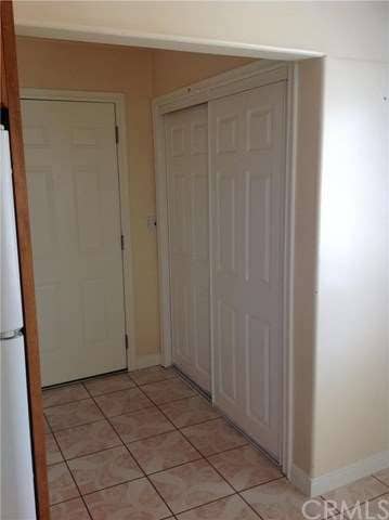 Front house laundry and exit to backyard.