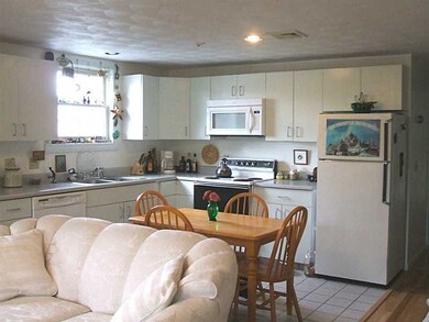 Kitchen. Eat-in kitchen, open to living area. New