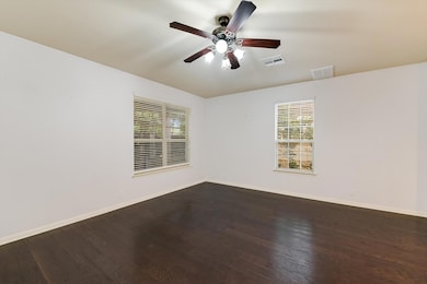 Spare room with dark wood-type flooring, healthy 