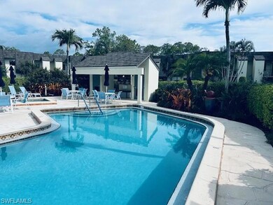 Community pool with a patio area