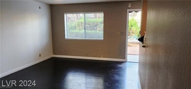 Unfurnished room featuring wood finished floors an