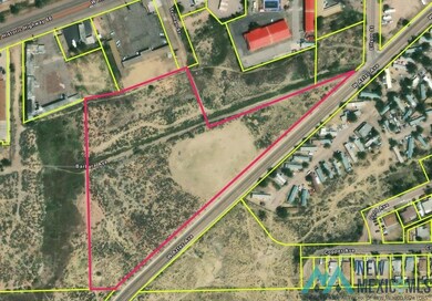 Aerial map of property and surrounding area featuring property parcel outlined
