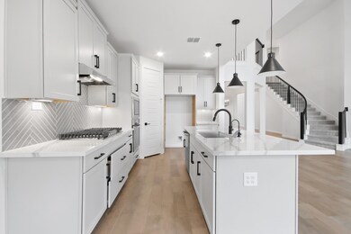 Light and bright kitchen with porcelain countertops!