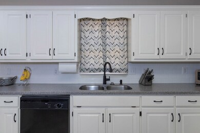 New cabinet hardware, sink and faucet