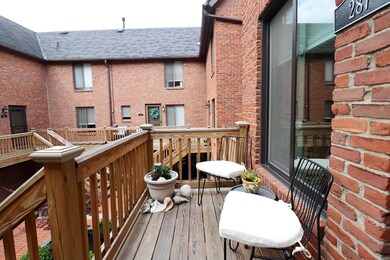 Front balcony overlooks courtyard