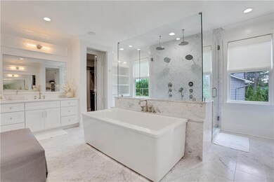 Spa-inspired bath in the primary upstairs suite.