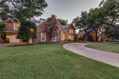 The corner lot allows for a wide circular driveway