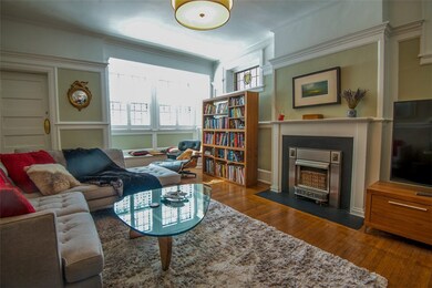 Living Room with fireplace, inviting window seat u