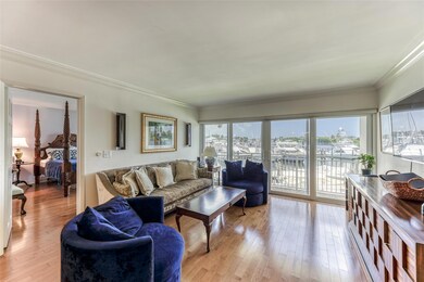 Living Room with wood flooring and gorgeous water