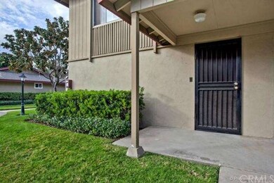 Iron security door under covered porch