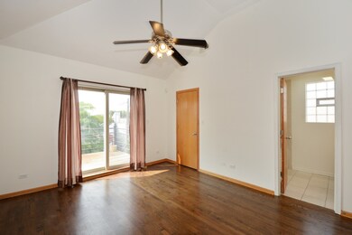 Spacious master suite with vaulted ceilings and sl