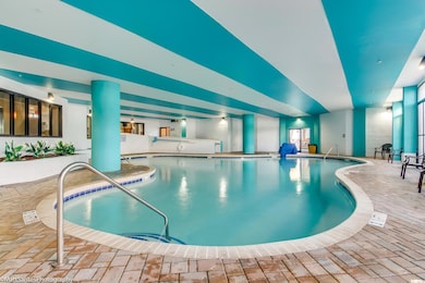 Pool featuring a jacuzzi