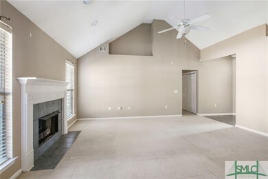 Cozy fireplace with tile surround and embellished 