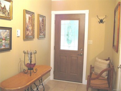 Spacious foyer with guest closet welcomes you home