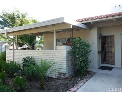 Inviting front entrance with private enclosed pati